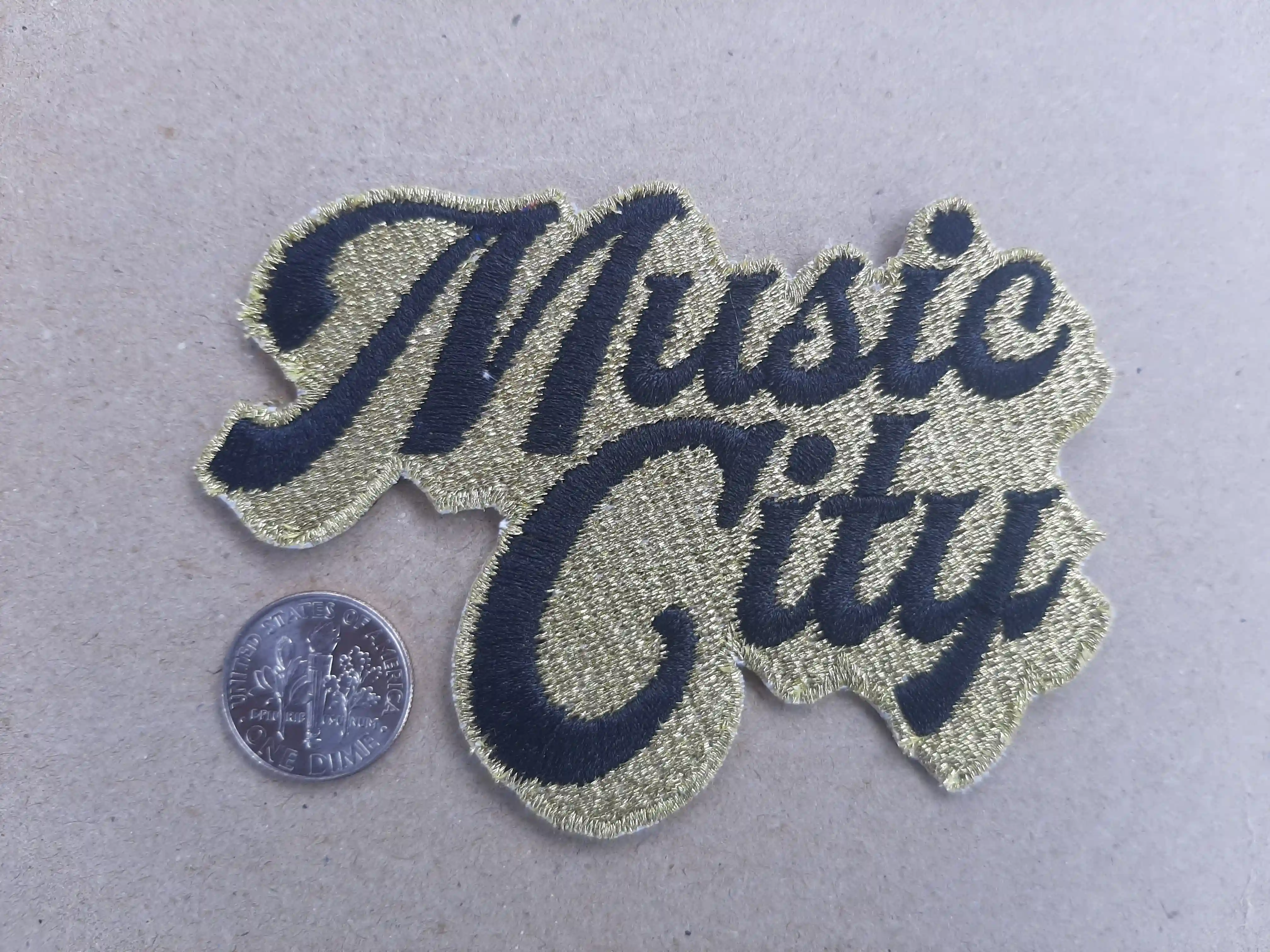 Nashville is Recording Hub and known for its singers. This patch is unique. It has a METALLIC Gold fill while a crisp satin is laid on top. That is SPECIAL – Embroidered Patches