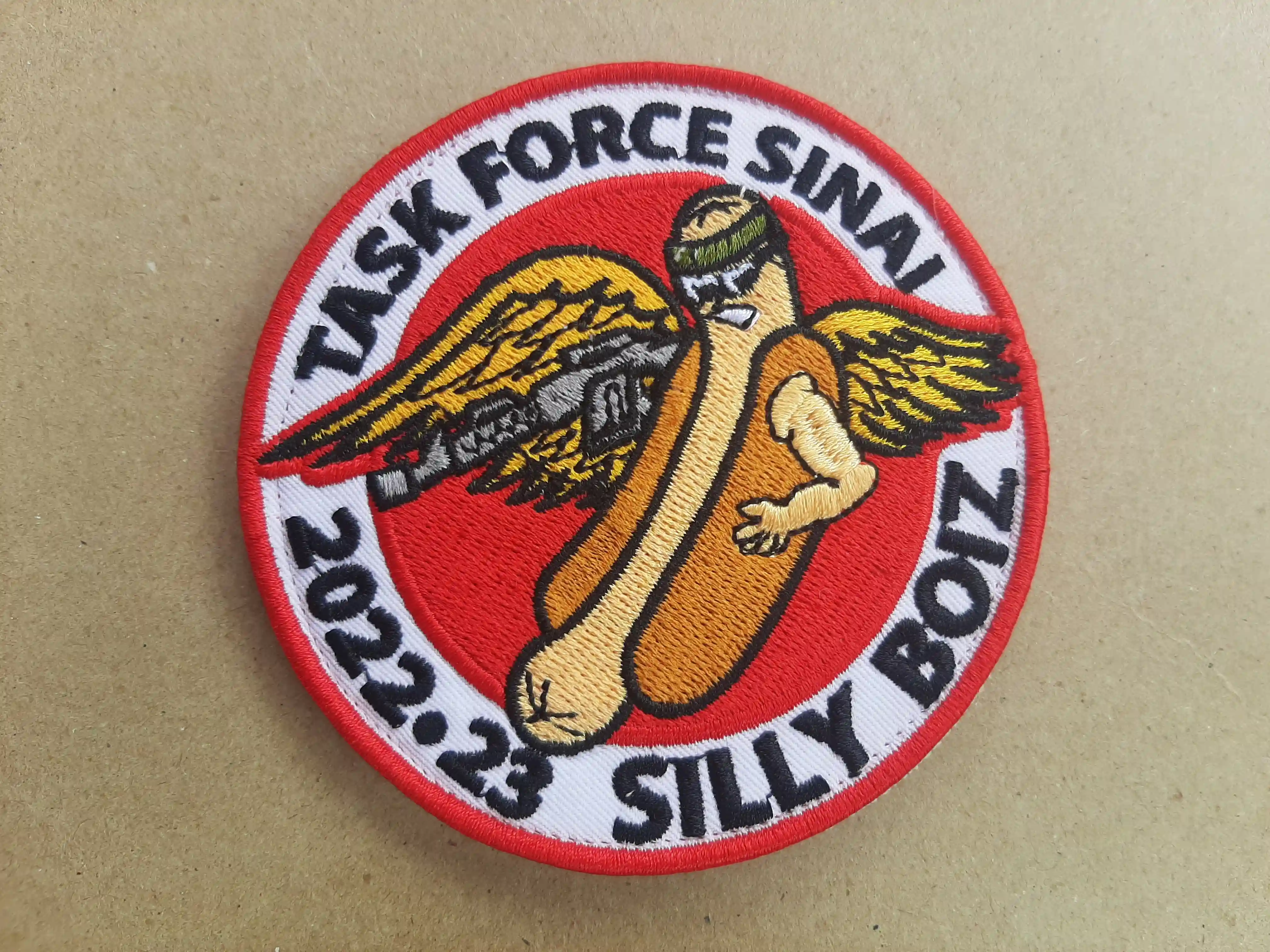 Winged Hot Dog Custom Designed Icon for Task Force Sinai. The spread eagle wings have crisp outlines even though the patch is small. Quality guaranteed – Embroidered Patches