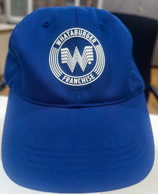 Embossed HD Transfer on a 6 panel Hat for What-A-Burger Franchise with crisp concentric circles not touching each other to create an elite iconic branding – High Density 3D Transfers