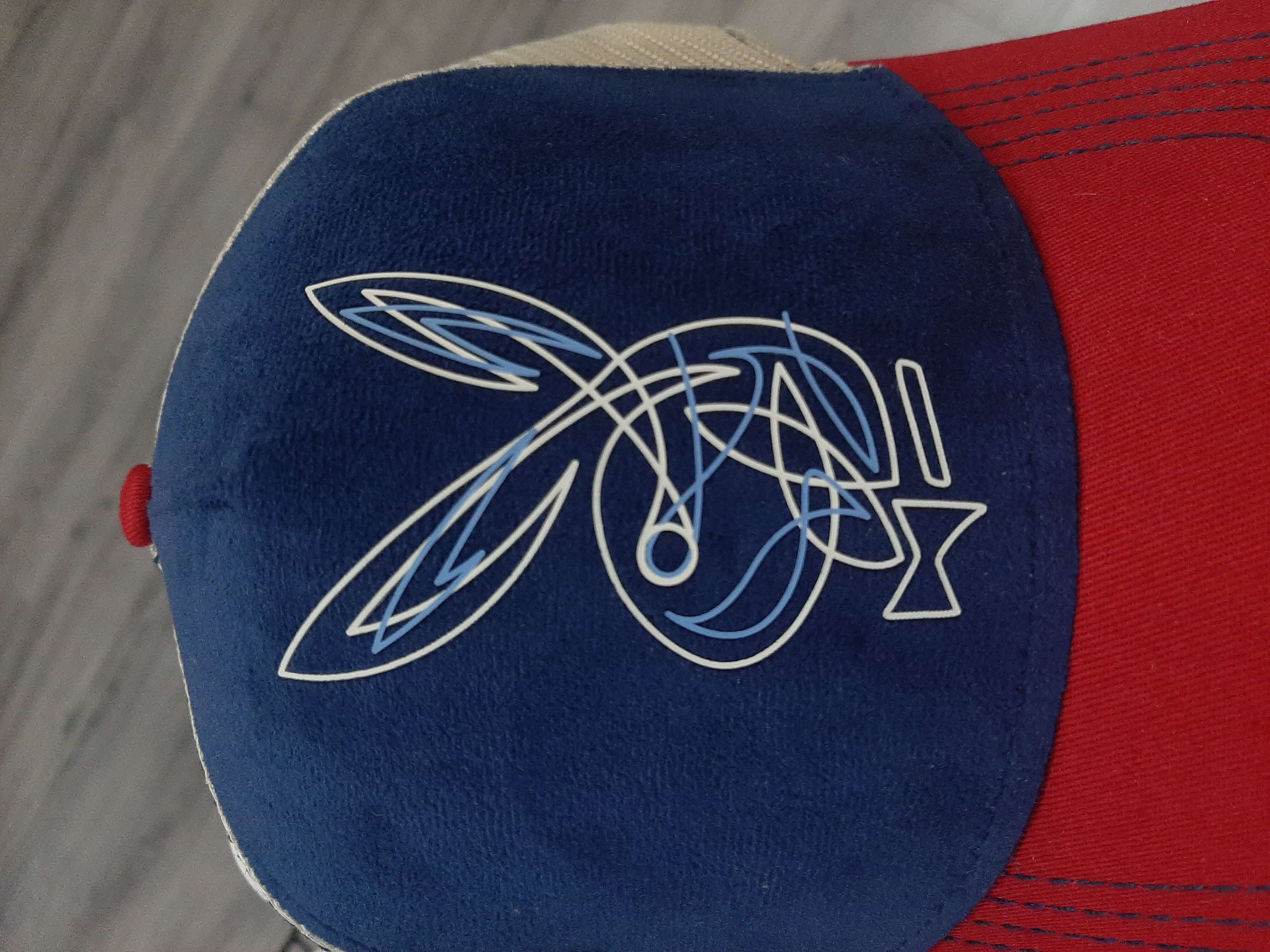 Thin outlined Silicone Transfer creating a stylish special appearance for an executive summit with medium embossed Rubberzed Multi Color logo – High Density 3D Transfers