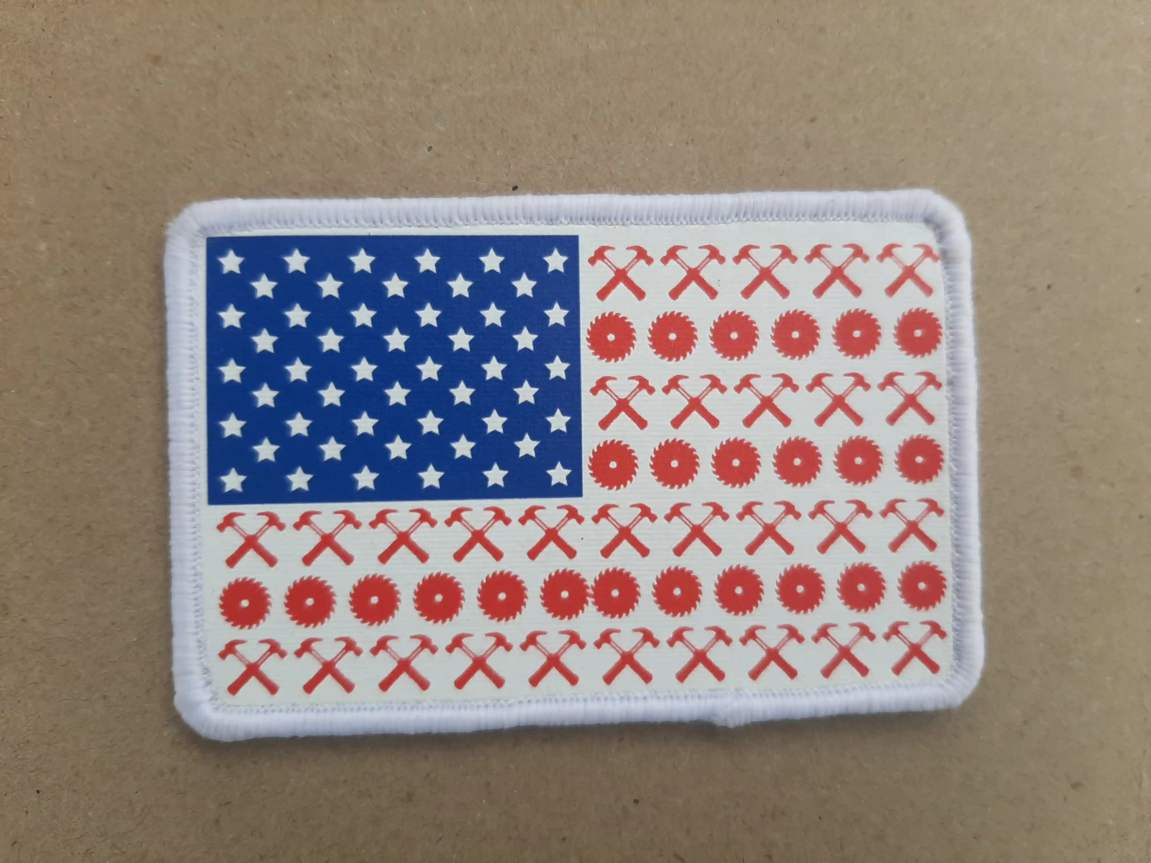 Proudly portraying Industrial tools with Axe, Hammers and Saw Blade on USA Flag. Create your own Unique USA Flag and we can help with Artwork.St_SD – Sublimated Patches